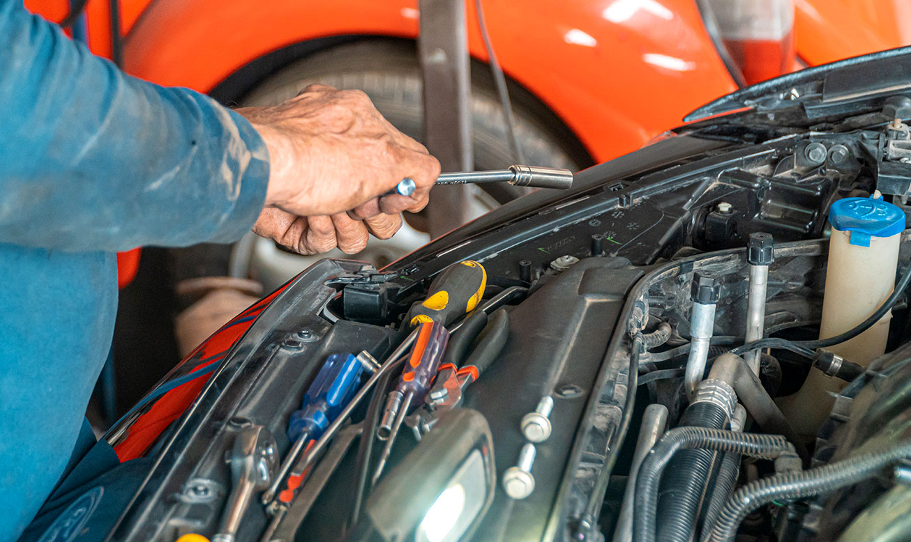 Mechanic Working on Car 2