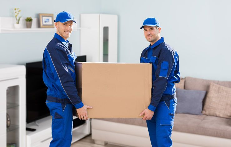 Two People Carrying a Box